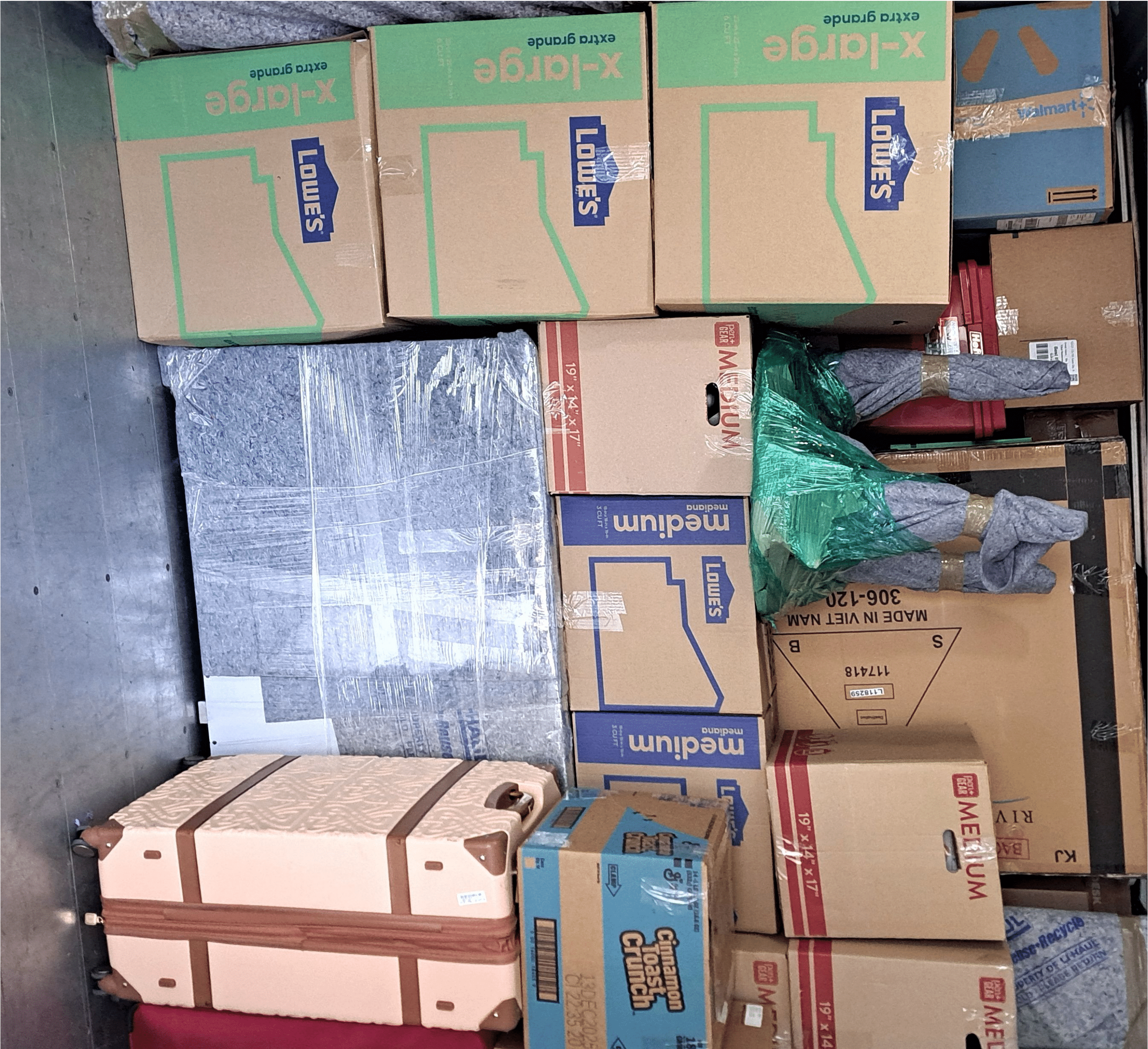 Absolute Muscle Movers team completing a long-distance move from Arkansas to Oklahoma